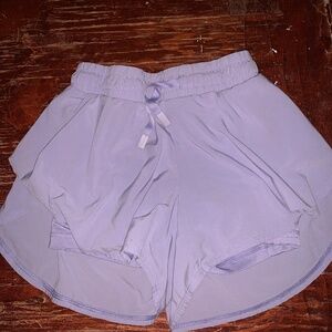 Lavender athletic wear shorts with pockets and double layered shorts